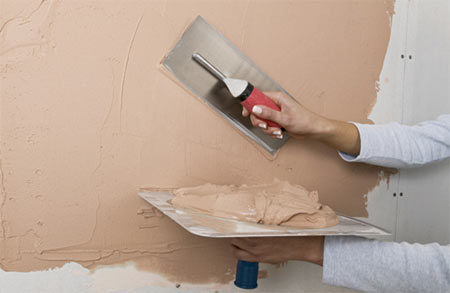 Plastering walls